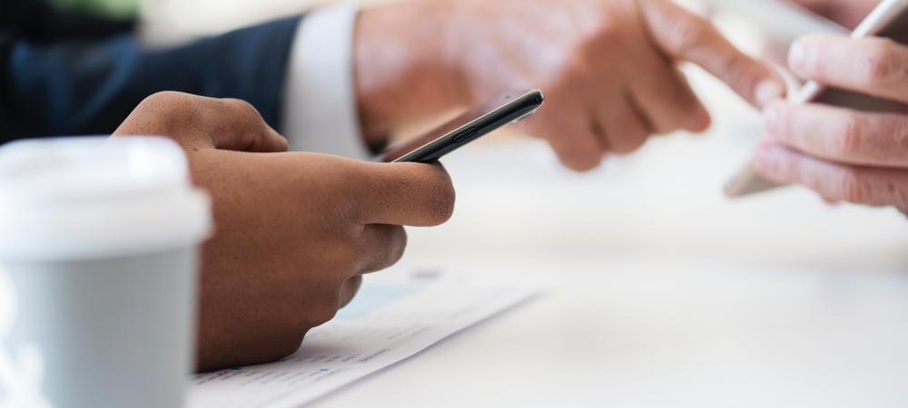 Person holding phone in hand