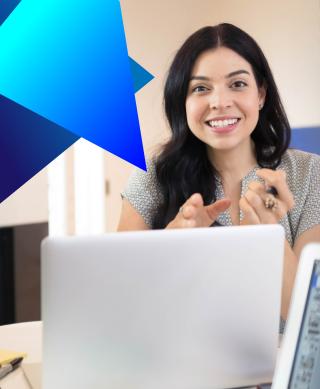 Female IT professional working on her laptop.