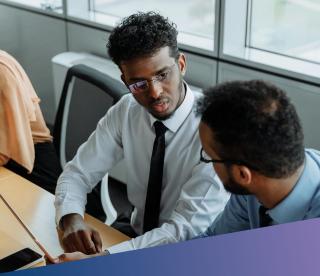 Two team members discussing ideas