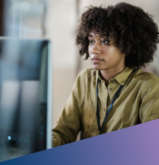 Cyber security professional at a modern workstation, focusing on enterprise resilience, security architecture, and proactive data protection.