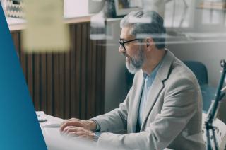 Manager sat at their desk in their office