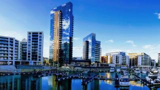 Ocean Village marina in Southampton, with glass apartment towers reflected in the water